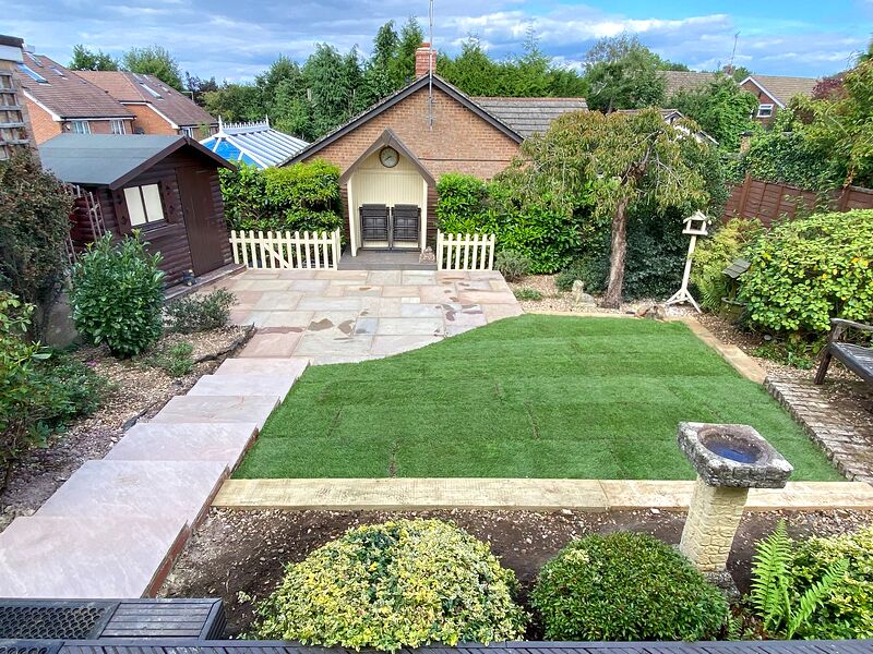 Rear garden with new sandstone path, patio, sleeper edging and freshly laid lawn